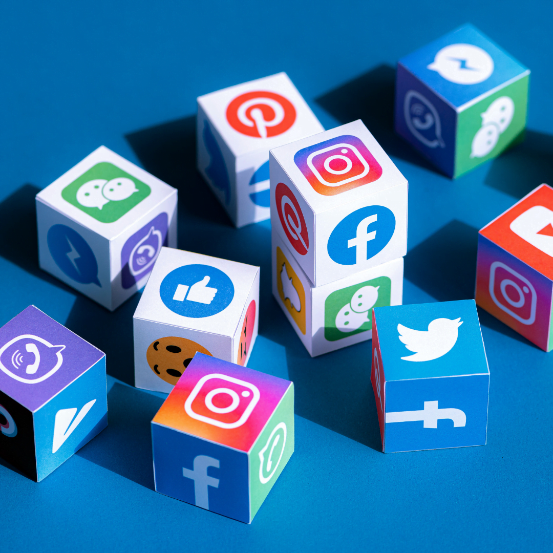 social media marketing graphic with social media logos on a bunch of dice